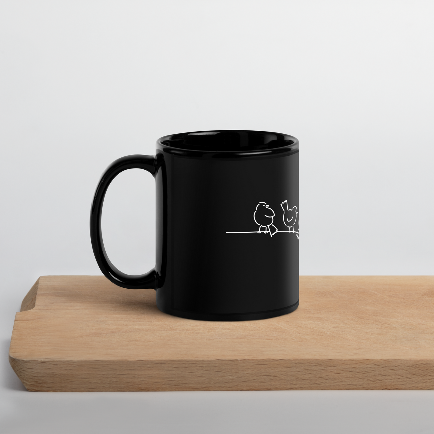 Cat on a wire Black Mug
