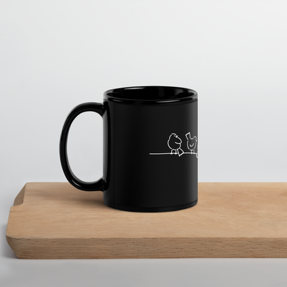 Cat on a wire Black Mug